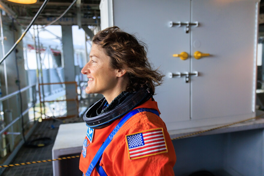 File: Artemis II NASA astronaut Christina Koch stands on the mobile launcher at Launch Pad 39B as part of an integrated ground systems test at Kennedy Space Center in Florida on Wednesday, Sept. 20, to test the crew timeline for launch day.