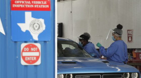 COVID-19 antibody testing and diagnostic testing are administered at a converted vehicle inspection station, Tuesday, July 7, 2020, in San Antonio. Local officials across Texas say their hospitals are becoming increasingly stretched and are in danger of becoming overrun as cases of the coronavirus surge. (Eric Gay/AP Photo)
