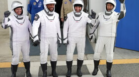 NASA astronauts, from left, Shannon Walker, Victor Glover, and Michael Hopkins and Japan Aerospace Exploration Agency astronaut Soichi Noguchi leave the Operations and Checkout Building on their way to launch pad 39A for the SpaceX Crew-1 mission to the International Space Station at the Kennedy Space Center in Cape Canaveral, Fla., Sunday, Nov. 15, 2020. (John Raoux/AP)