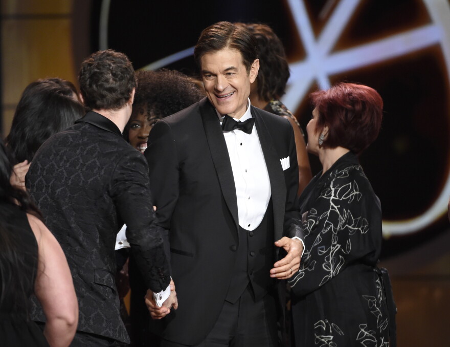 Dr. Mehmet Oz reacts to winning the award for outstanding informative talk show for "The Dr. Oz Show" at the 44th annual Daytime Emmy Awards at the Pasadena Civic Center on Sunday, April 30, 2017, in Pasadena, Calif. 