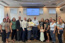 Wasatch County School District Board of Education members celebrate the opening of the district's first childcare center with center staff, students and parents on Aug. 27, 2026.