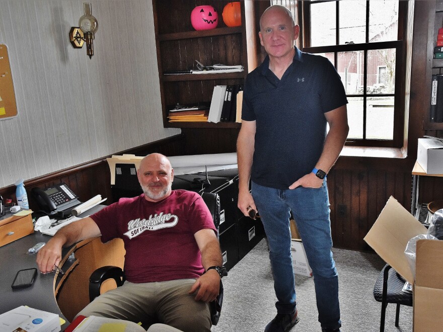 Peninsula Mayor Dan Schneider (seated) and Councilman John Krusinski in the mayor's office.