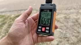 Jason Haley measures noise near xAI's gas turbines in Southaven, Mississippi, on Aug. 14, 2026.