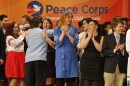 Volunteers of US Peace Corps celebrate after they swear an oath of allegiance in Kiev, Ukraine, Thursday, Nov. 30, 2017.