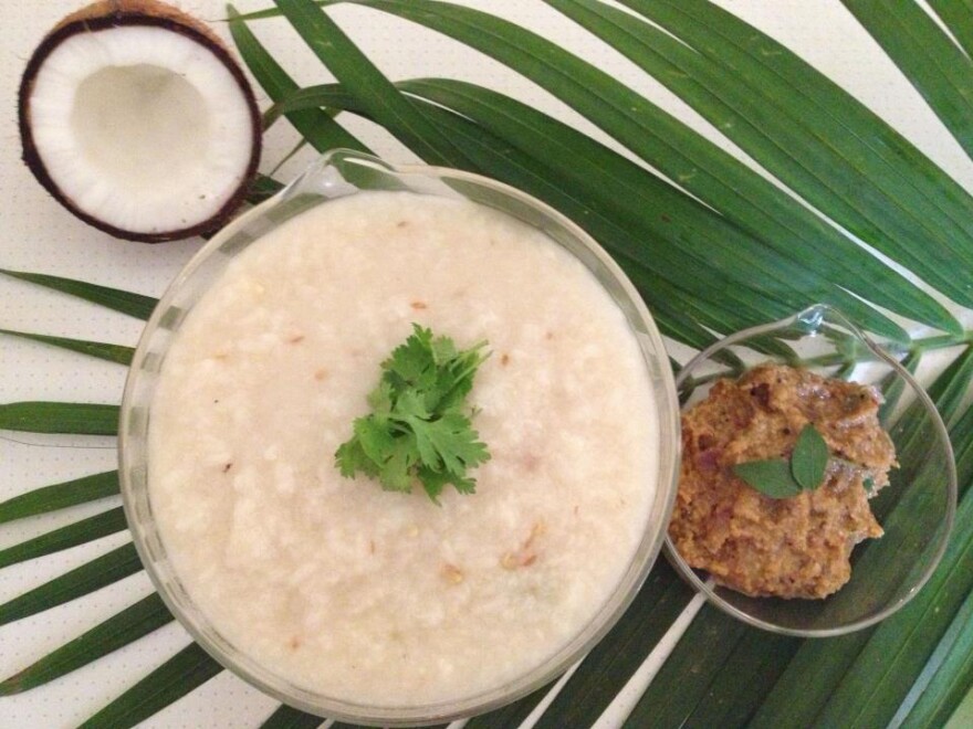 A bowl of <em>nombu kanji</em> prepared by Tamil cookbook author and food blogger Hazeena Seyad. "Rice is the staple food in Tamil Nadu and Kerala," she explains, "and the <em>nombu kanji,</em> with its rice and lentil base, offers a nutritious and accessible meal after a long day's fast."