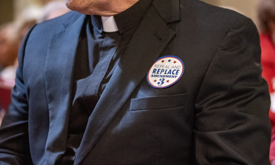 Stickers saying "repeal and replace Amendment 3" were distributed during Missouri Right to Life advocacy day at the Missouri State Capitol.