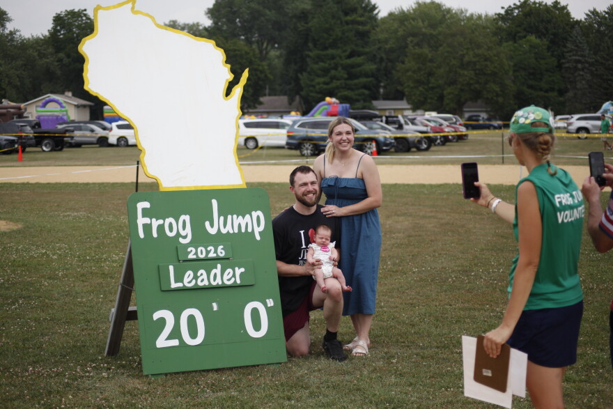 Hunter, Ashlyn, and Emery Rose pose for pictures after Emery Rose’s frog set a new record for the Wisconsin State Frog Jump. (credit: Dan Wanschura / Points North)