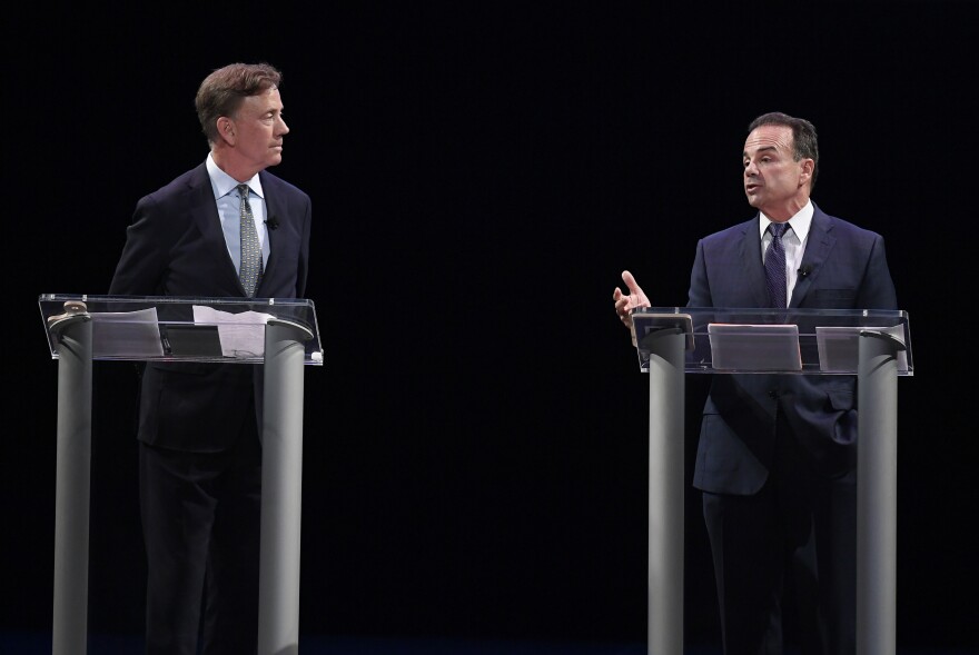 Democratic candidates for governor Ned Lamont, left, and Bridgeport Mayor Joe Ganim debate in New Haven, Conn., Thursday. Lamont is the party's endorsed candidate, while Ganim petitioned his way onto the Aug. 14 ballot. 
