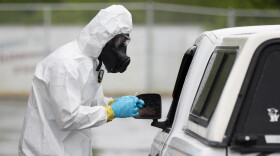File photo of a North Carolina National Guard soldier with the 42nd Civil Support Team conducting drive-thru and walk-up COVID-19 testing in Chatham County on April 23, 2020.