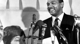 Carl B. Stokes makes a victory statement at his campaign headquarters in Cleveland, Oct. 3, 1967, after almost complete returns indicated he had won the Democratic nomination for mayor of Cleveland by a margin of more than 12,000 over the incumbent mayor, Ralph S. Locher. Stokes' wife, Shirley, is on the left. (AP Photo)