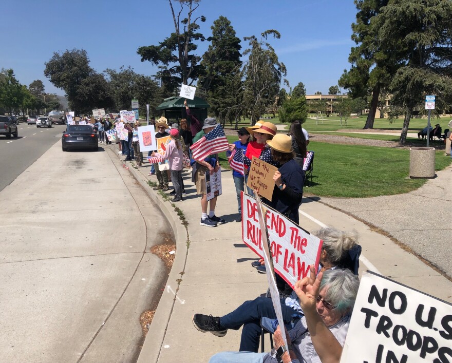 Hundreds of protestors took part in a May Day demonstration outside of the Ventura County Government Center Friday afternoon.