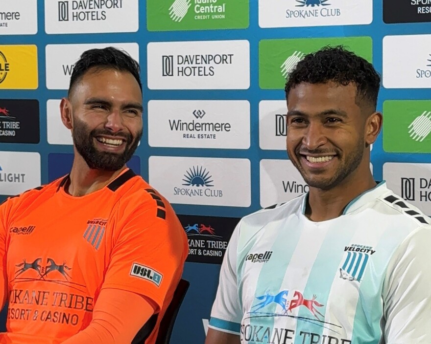 Carlos Merancio, left, and Anuar Pelaez, right, after their first round playoff win.