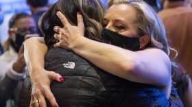 U.S. House candidate Kendra Horn hugs her campaign team member, Kandace Howell, after a loss to Stephanie Bice at the Tower Theatre in Oklahoma City, Okla., Tuesday, Nov. 3, 2020.