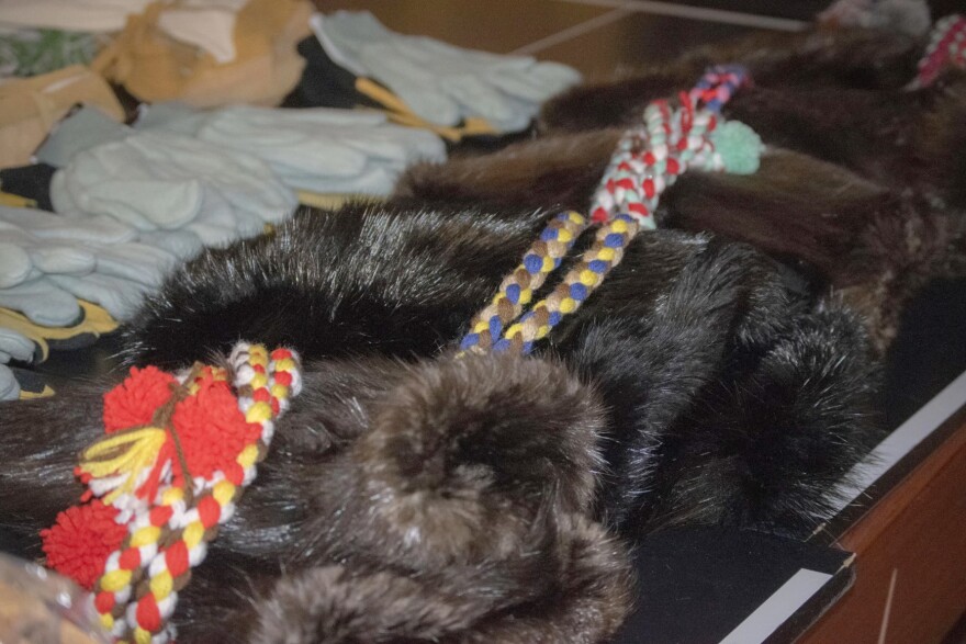 Yukon Quest volunteer Corrima Cadzow and her aunt, Louie Fairchild crafted five pairs of beaver mittens for the competitors.