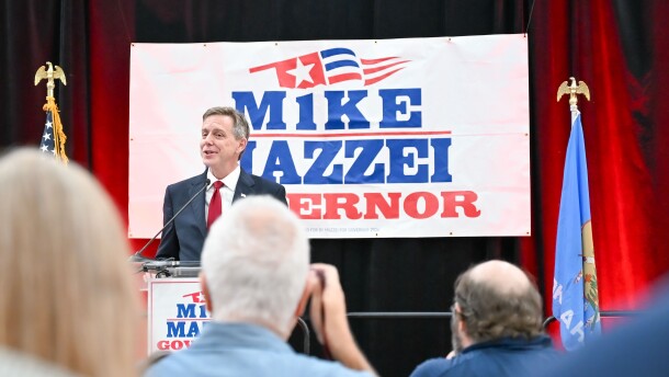 Mike Mazzei speaks to a crowd of supporters before runoff election results were finalized on Tuesday, Aug. 25, 2026.