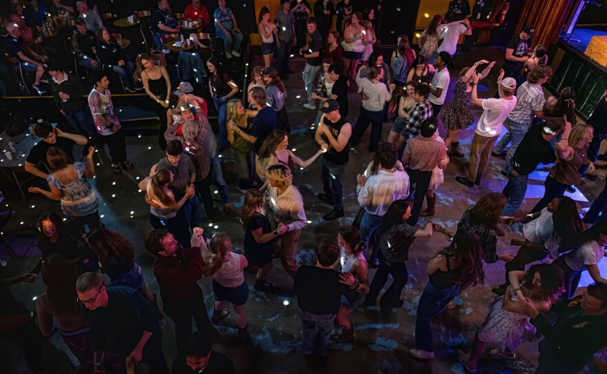 Country dancers from the mezzanine at Eastside Bowl on a recent Honky Tonk Tuesday