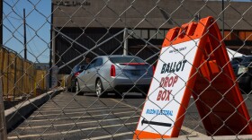Sign with arrow pointing to Ballot Drop Box
