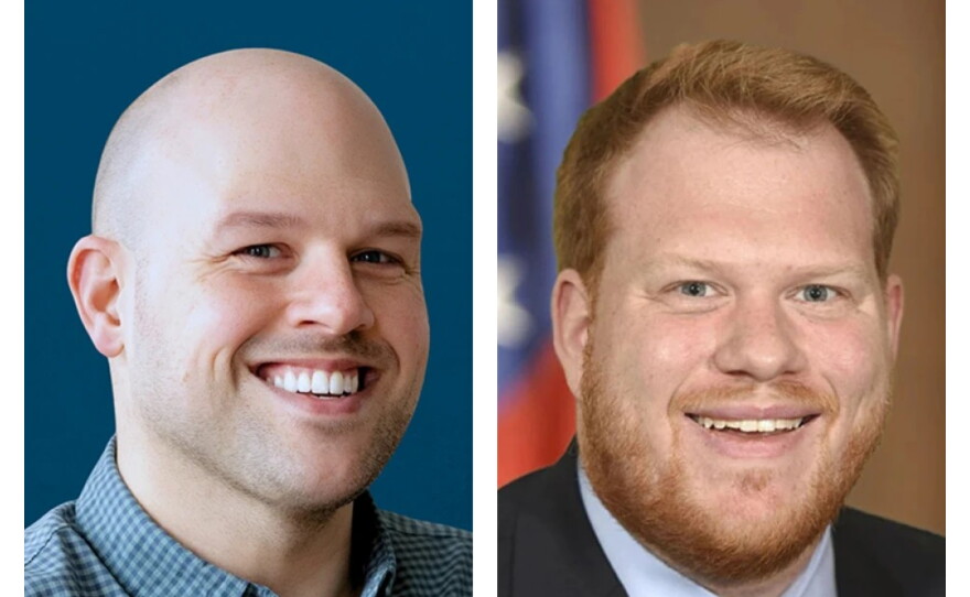 A joined photo of two smiling men: The photo at left includes a bald man wearing a blue checked button-down shirt; the photo at right includes a red-haired man with a red mustache and beard wearing a white button-down shirt, a red tie with blue and white stipes, black suitcoat, and an American flag lapel pin
