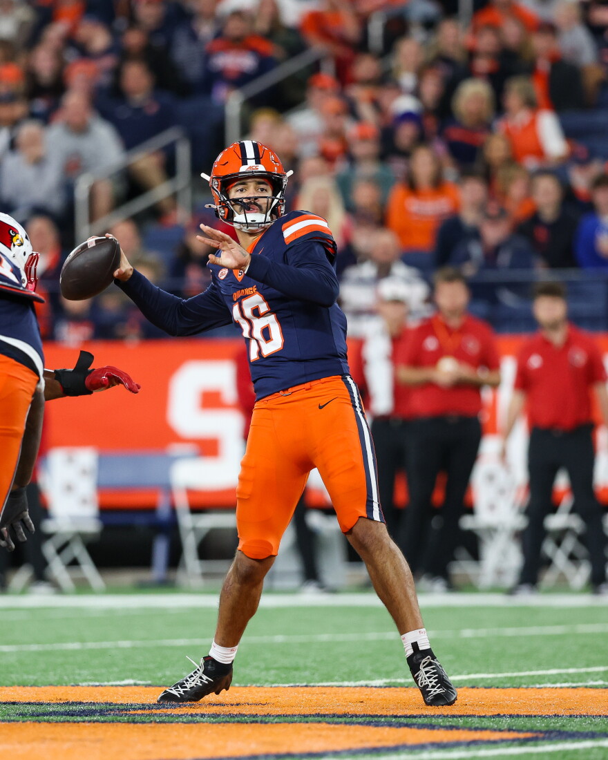 Syracuse quarterback Malachi Nelson (16, Blue) prepares to make a throw in SU’s loss to Louisville.