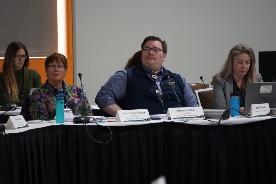 Nanci Morris Lyon, from Dillingham, and Thomas Baker, from Kotzebue, listen on March 5 to comments from regional representatives about commercial fishery conflicts with subsistence resources. Morris Lyon and Baker are co-chairs of the 2024 All-Council meeting of the state’s 10 subsistence regional advisory councils. Baker is a state representative. The meeting is being held at Anchorage’s Dena’ina Civic and Convention Center.