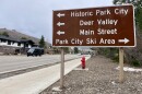 A sign points visitors toward Park City’s ski areas on Park Avenue.