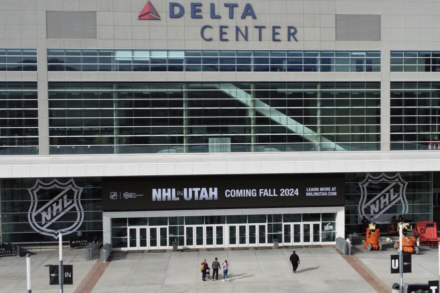 Signs celebrating the awarding of a new NHL team to Utah aere shown at the Delta Center, April 19, 2024, in Salt Lake City. The NHL team moving from Arizona to Salt Lake City will be known as Utah at least initially. New owner Ryan Smith says the name will begin with Utah and he does not want to rush the process of rebranding the franchise upon relocation.