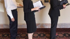 Job seekers wait in line to show their resumes to potential employers at a career fair on September 2, 2010 in Denver, Colorado.