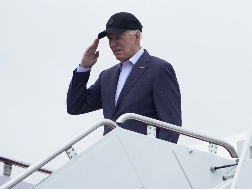 President Biden salutes as he boards Air Force One as he leaves Andrews Air Force Base, Md., on his way to his Delaware home on Friday.