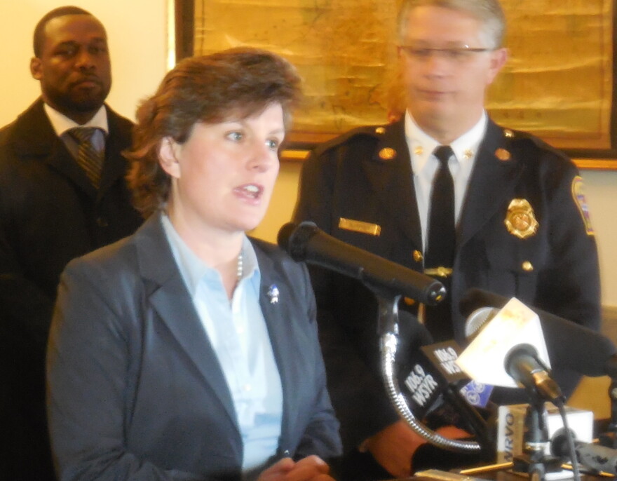 mayor miner speaking at a podium