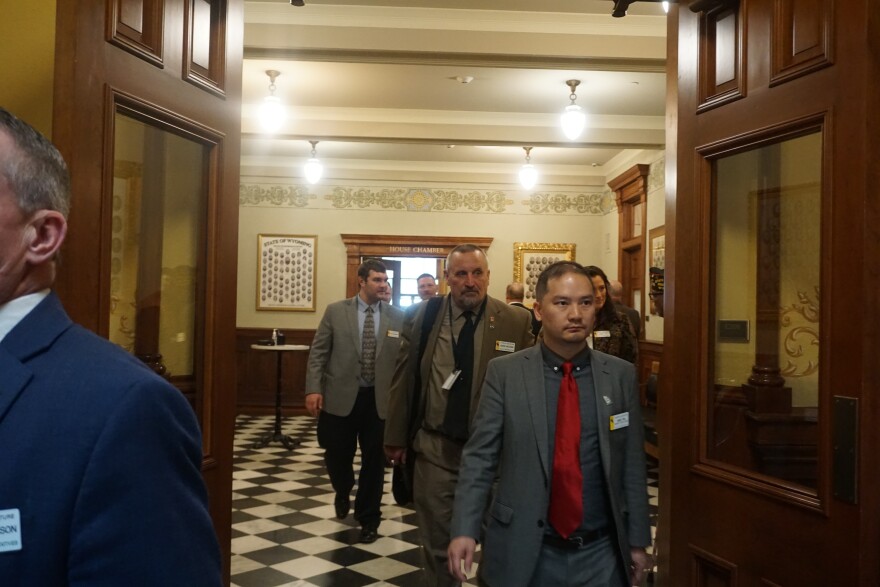 Rep. Mike Yin (D-Jackson) walks through the House lobby during the 2026 budget session.
