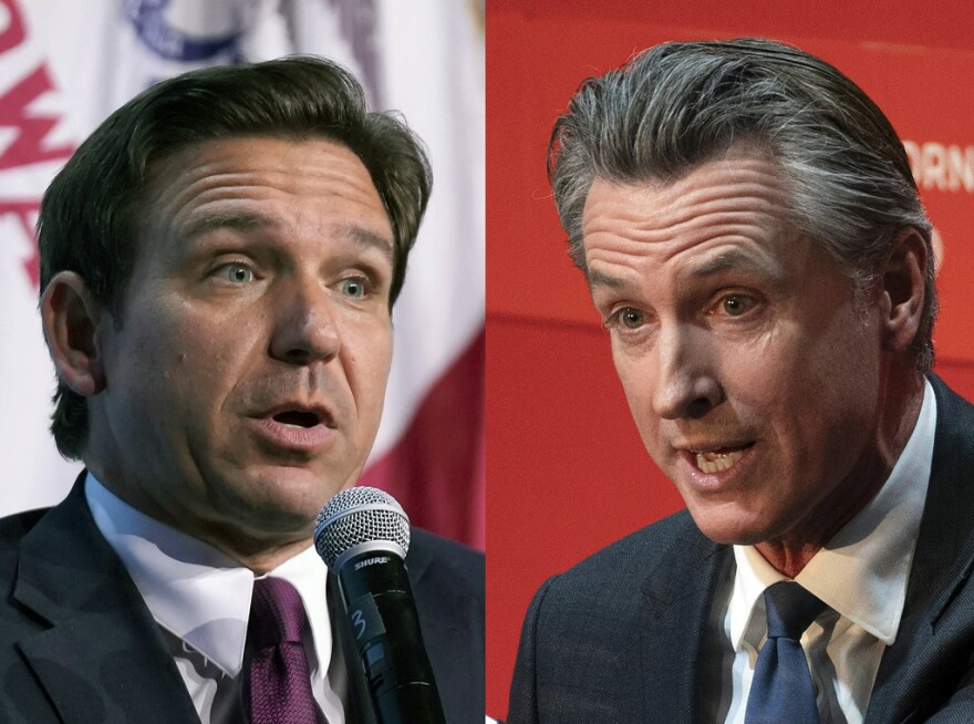 In this combination of photos, Florida Gov. Ron DeSantis speaks, at left, and California Gov. Gavin Newsom, speaks.