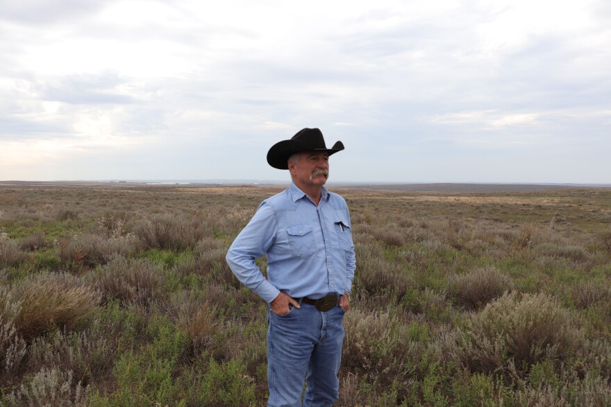 Mark Gardiner looks over some of the prairie on his 48,000-acre ranch.