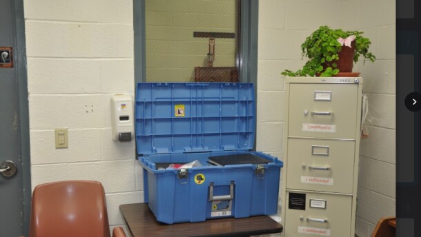 The window to Kenneth Dewitt's office.