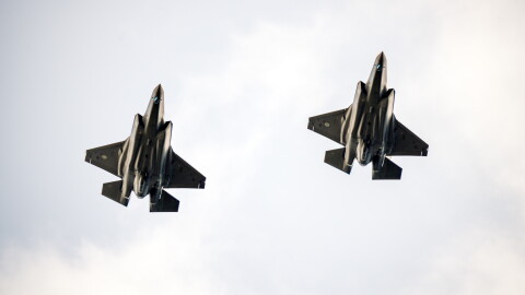 Two US F 35 fighter jets training.