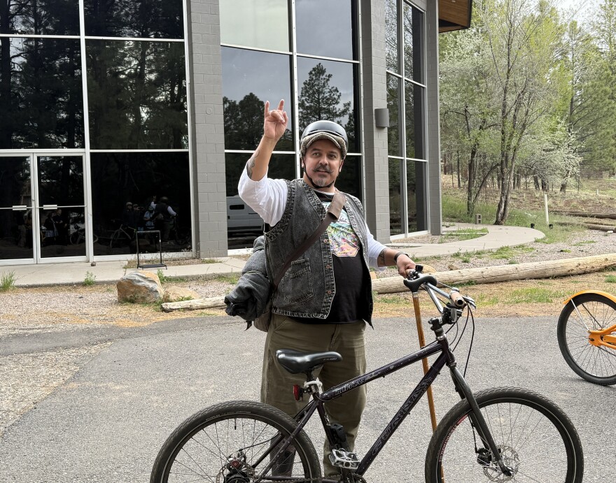 The Flagstaff local known as Dapper Dre prepares to lead a bike parade from the Coconino Center for the Arts to downtown Flagstaff on May 1, 2026.