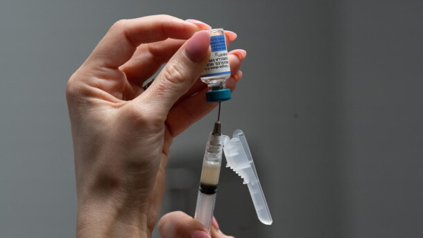 A nurse, prepares a combination measles, mumps and rubella vaccine for a patient at a pediatrics clinic in Easley, S.C. | Wisconsin Public Radio
