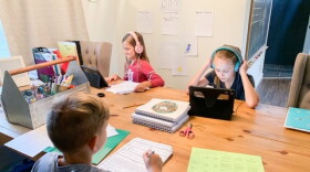 The Clampitt siblings participate in e-learning from home.