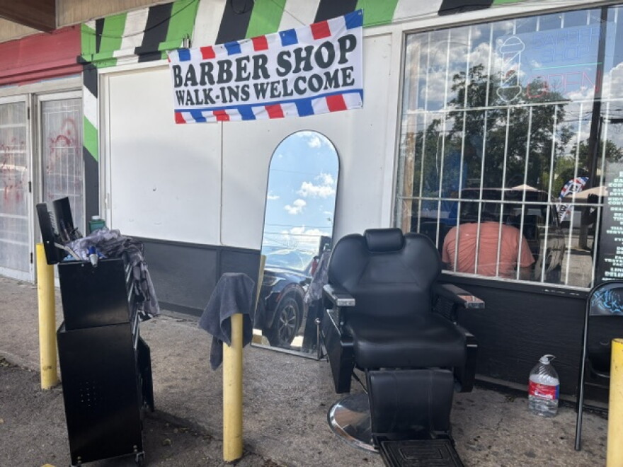 The Misfit barbershop on the West Side of San Antonio. Owner and barber, Juan Martinez, opened his business as usual to his clients — outside —even though he had no power inside his barbershop. Severe storms on Aug. 28, 2026, caused damage to homes in the area.