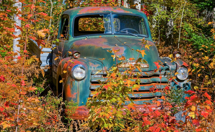 "It could be beside that old rusting Chevy pickup just outside the Oak Leaf Auto Salvage entrance."