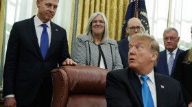 Acting Secretary of Defense Patrick Shanahan listens as President Trump speaks during a signing event for "Space Policy Directive 4" in the Oval Office of the White House in February.