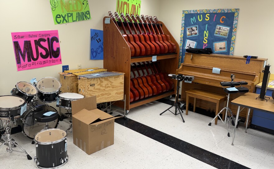 Music teacher Dina Linaro said she can finally teach guitar because she has enough instruments.