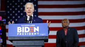 FILE - Democratic presidential candidate former Vice President Joe Biden speaks at a primary night election rally in Columbia, S.C., Feb. 29, 2020, after winning the South Carolina primary, as Rep. James Clyburn, D-S.C., watches. (AP Photo/Matt Rourke, File)