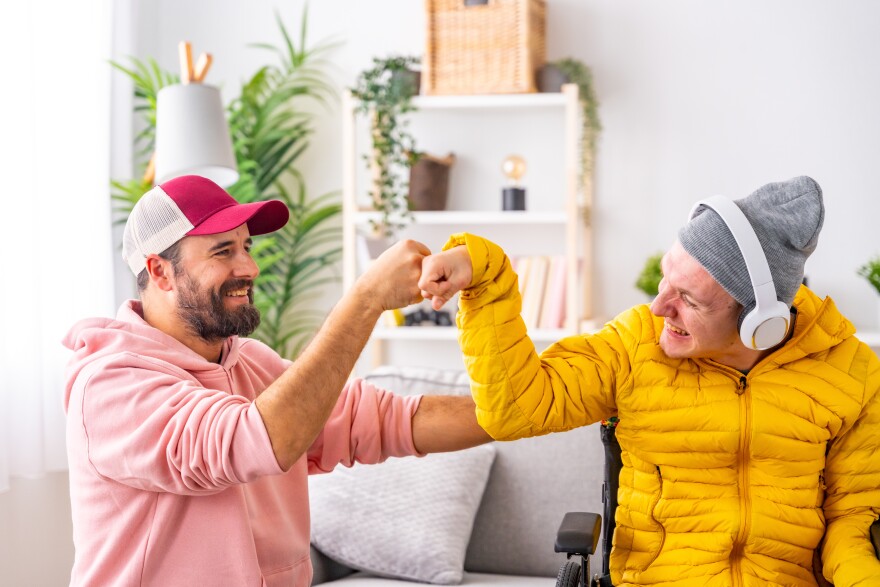 Disabled man and friend