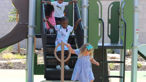 Dozens of children enjoy the new playground at Broadway Parque, which celebrated its opening in Fresno’s South Tower neighborhood Thursday, July 31, 2025.
