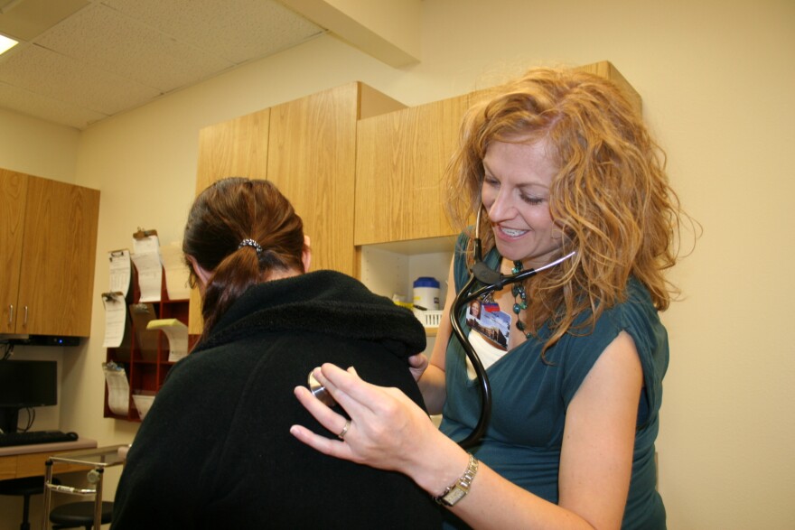 Dr. Amanda Schultz works with a patient in the San Luis Valley Regional Medical Center’s Physician Services division in Alamosa, Colorado. The San Luis Valley Regional Medical Center is an integrated healthcare facility with the only full service hospita