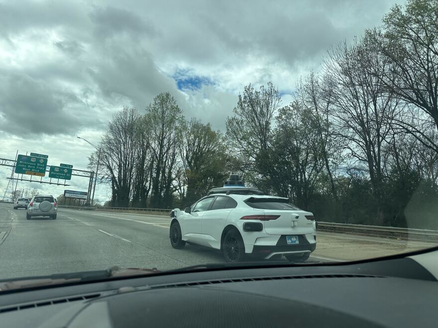 A Waymo car seen driving on 1-85.