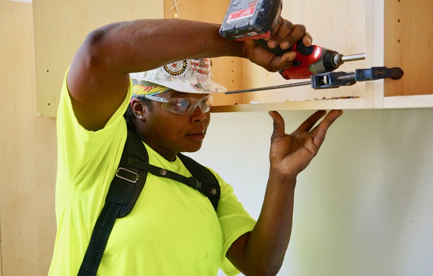 Carpenter Tyeka Robinson said she wishes she would have had more encouragement from women in the building trades when she was first starting out.