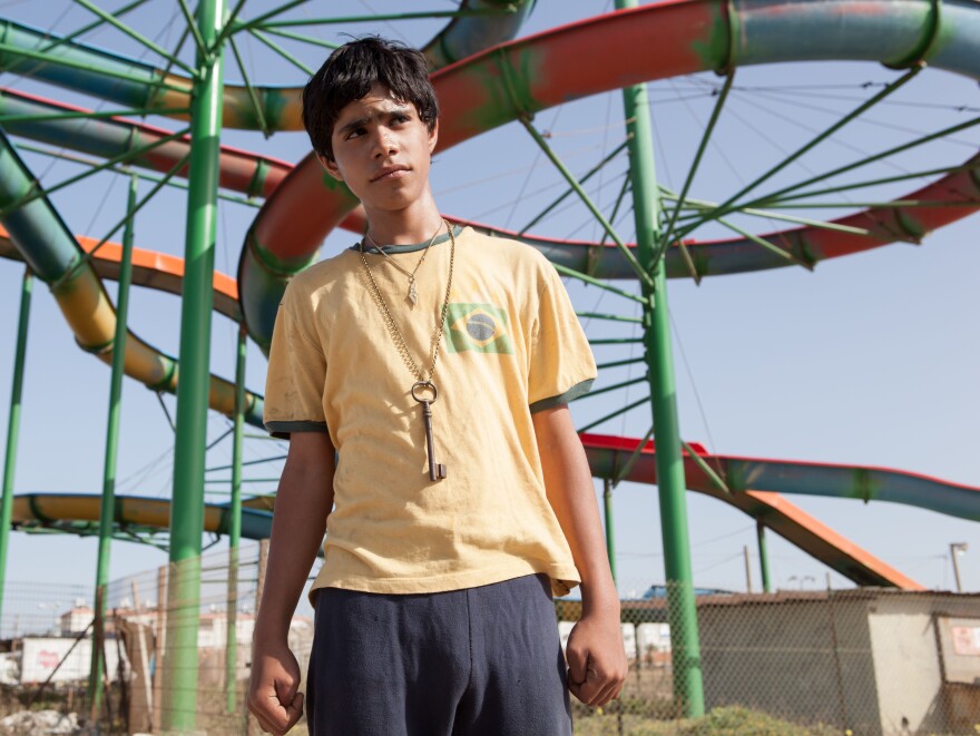 Even with the severity and danger of their situation, Fahed and Yoni enjoy a stop at an abandoned amusement park.