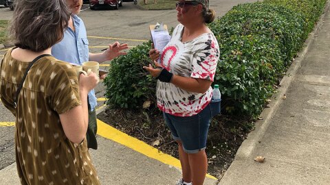 Amy Sutherly gathers signatures to put a referendum of HB6 on the 2020 November ballot. She has a brace around her wrist saying she sustained the injury after a counter petitioner hit her.