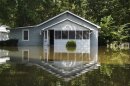 A flooded home is seen in Indianapolis, Sunday, Aug. 16, 2026.